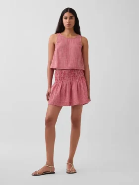 Mini-jupe-short en gaze de coton à taille smockée