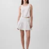 Mini-jupe-short en gaze de coton à taille smockée