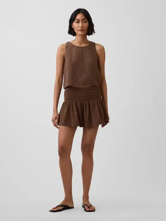 Mini-jupe-short en gaze de coton à taille smockée