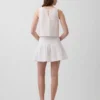 Mini-jupe-short en gaze de coton à taille smockée