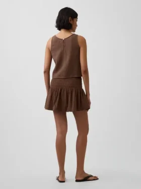 Mini-jupe-short en gaze de coton à taille smockée