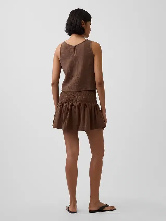 Mini-jupe-short en gaze de coton à taille smockée