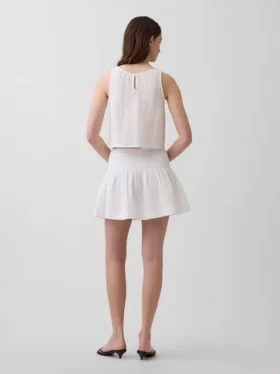 Mini-jupe-short en gaze de coton à taille smockée