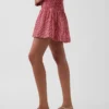 Mini-jupe-short en gaze de coton à taille smockée