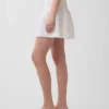 Mini-jupe-short en gaze de coton à taille smockée