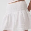 Mini-jupe-short en gaze de coton à taille smockée