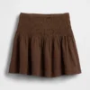 Mini-jupe-short en gaze de coton à taille smockée