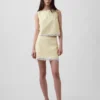Mini-jupe-short en mélange de lin avec bordure en dentelle
