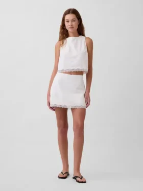 Mini-jupe-short en mélange de lin avec bordure en dentelle