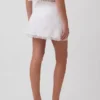 Mini-jupe-short en mélange de lin avec bordure en dentelle