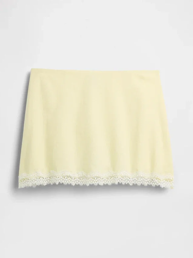 Mini-jupe-short en mélange de lin avec bordure en dentelle