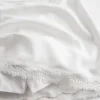 Mini-jupe-short en mélange de lin avec bordure en dentelle