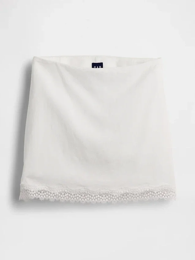 Mini-jupe-short en mélange de lin avec bordure en dentelle