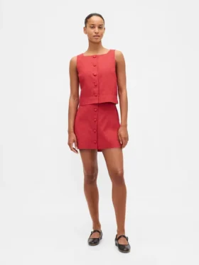 Mini-jupe-short en mélange de lin à boutonnage sur le devant