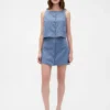 Mini-jupe-short en mélange de lin à boutonnage sur le devant