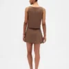 Mini-jupe-short en mélange de lin à boutonnage sur le devant