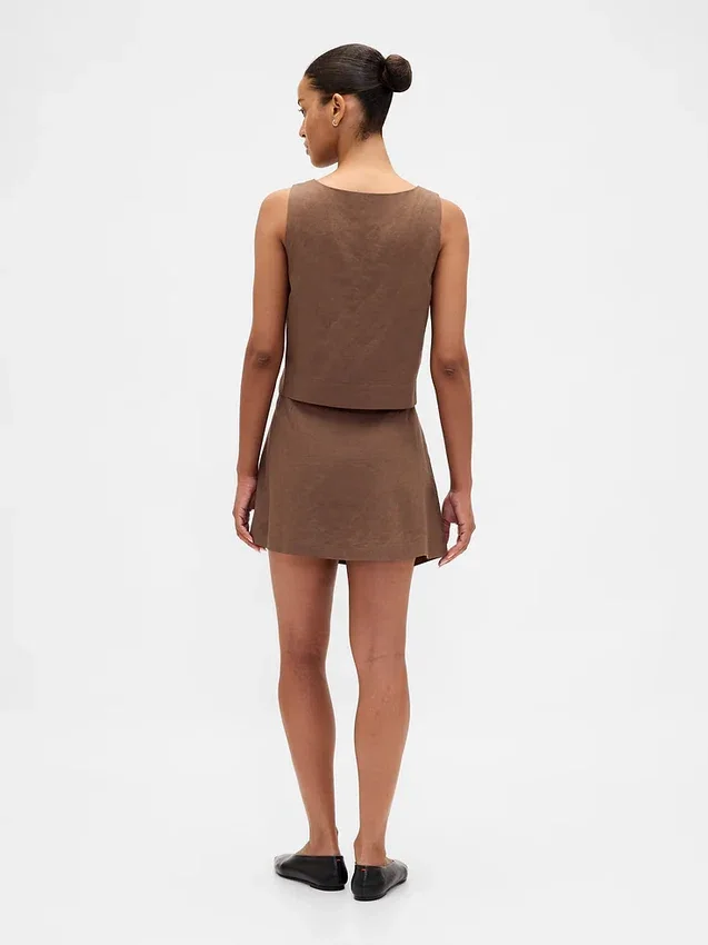 Mini-jupe-short en mélange de lin à boutonnage sur le devant