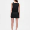 Mini-jupe-short en mélange de lin à boutonnage sur le devant