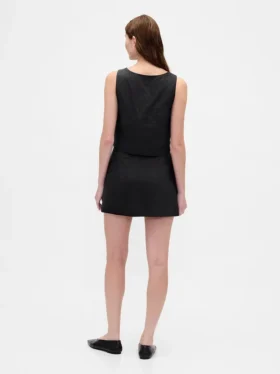Mini-jupe-short en mélange de lin à boutonnage sur le devant