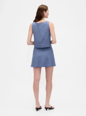 Mini-jupe-short en mélange de lin à boutonnage sur le devant