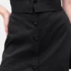 Mini-jupe-short en mélange de lin à boutonnage sur le devant