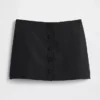 Mini-jupe-short en mélange de lin à boutonnage sur le devant