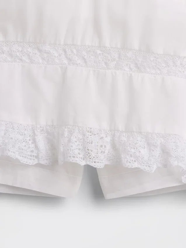Mini-jupe-short facile à enfiler à plis et bordure en dentelle