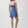 Mini-robe à empiècements en denim