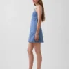 Mini-robe à empiècements en denim