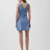 Mini-robe en denim à coutures apparentes et fermeture éclair sur le devant