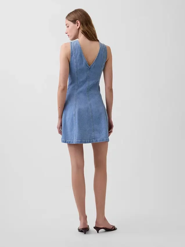 Mini-robe en denim à coutures apparentes et fermeture éclair sur le devant