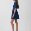Mini-robe en denim à manches bouffantes et encolure en cœur
