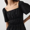 Mini-robe en popeline à manches flottantes