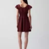 Mini-robe à encolure dégagée et bordure en dentelle