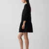 Mini-robe à taille basse bordée de dentelle