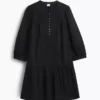 Mini-robe à taille basse bordée de dentelle