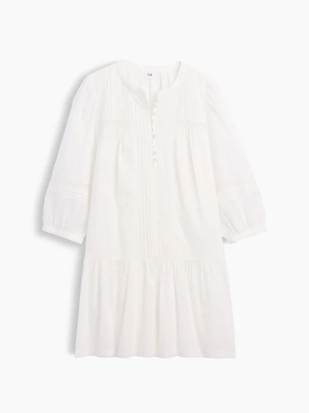Mini-robe à taille basse bordée de dentelle