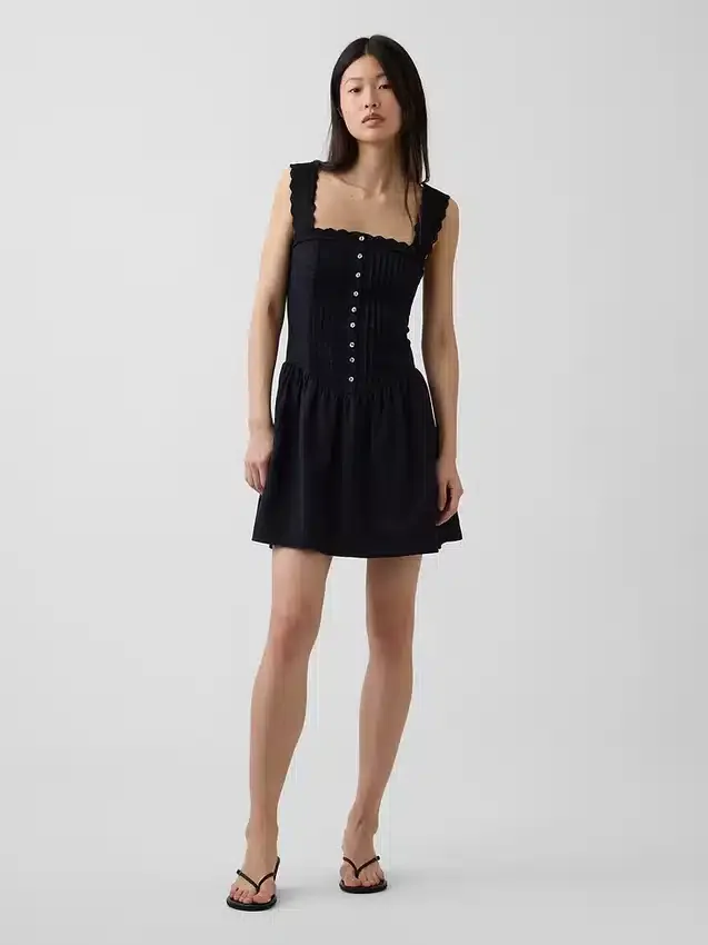 Mini-robe à taille basse et plis creux