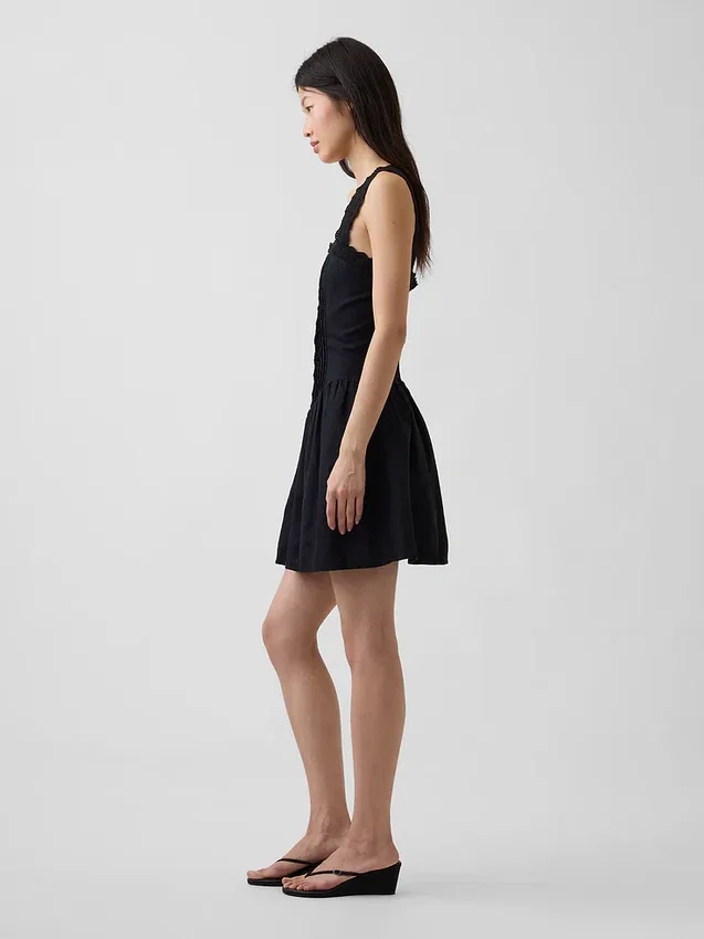 Mini-robe à taille basse et plis creux