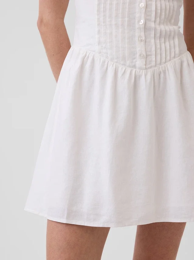 Mini-robe à taille basse et plis creux