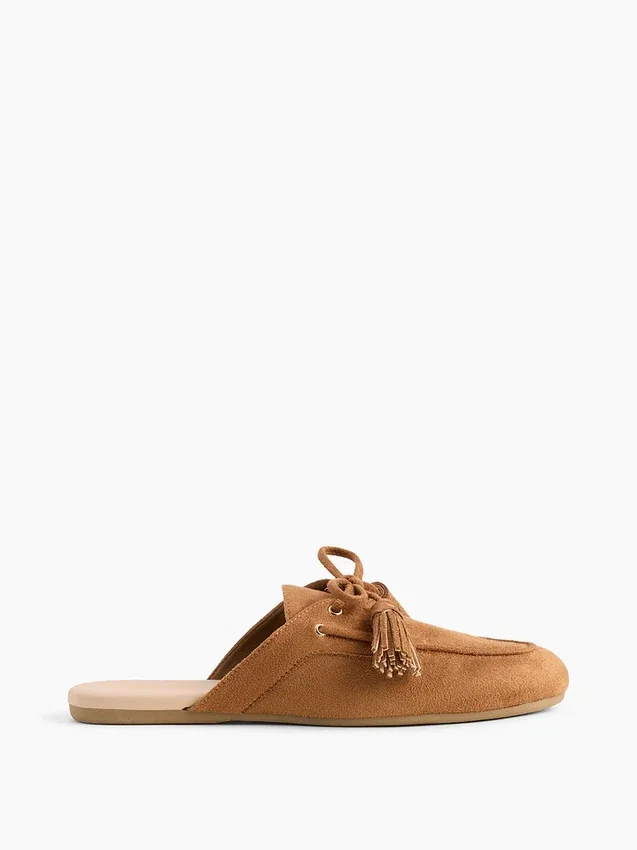 Mules mocassins à pompons en daim vegan