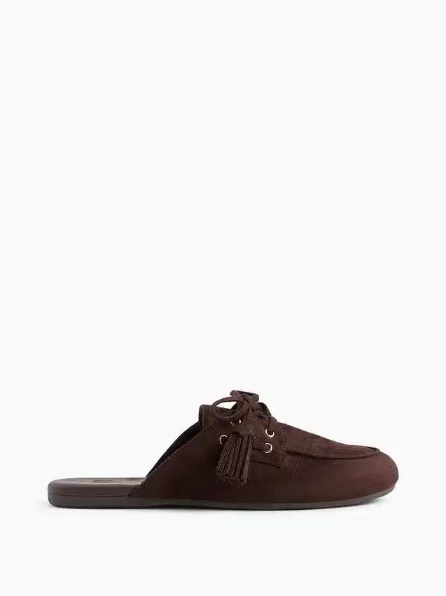 Mules mocassins à pompons en daim vegan