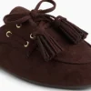 Mules mocassins à pompons en daim vegan