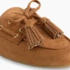 Mules mocassins à pompons en daim vegan