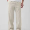 Pantalon ample et fuselé en lin et coton