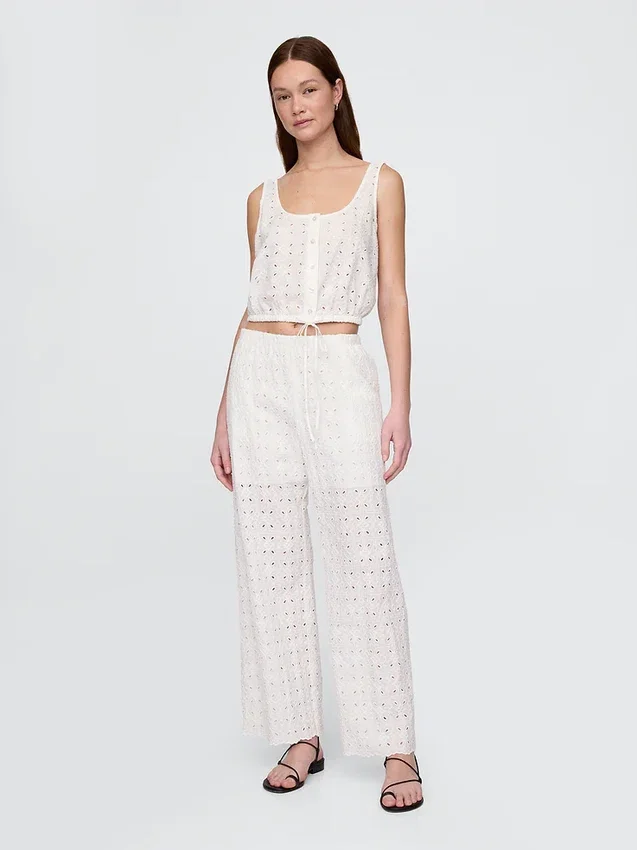 Pantalon ample à taille mi-haute et œillets
