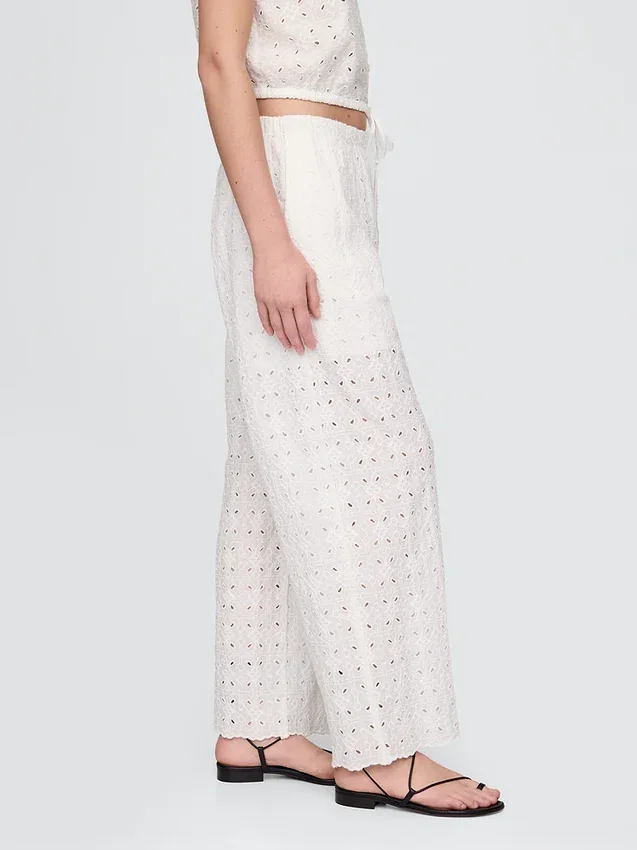 Pantalon ample à taille mi-haute et œillets