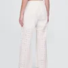 Pantalon ample à taille mi-haute et œillets