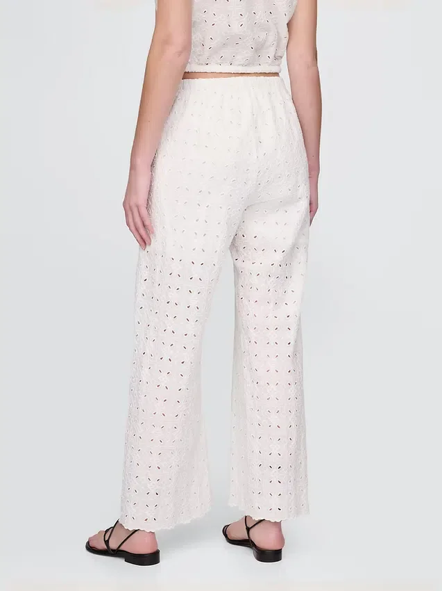 Pantalon ample à taille mi-haute et œillets