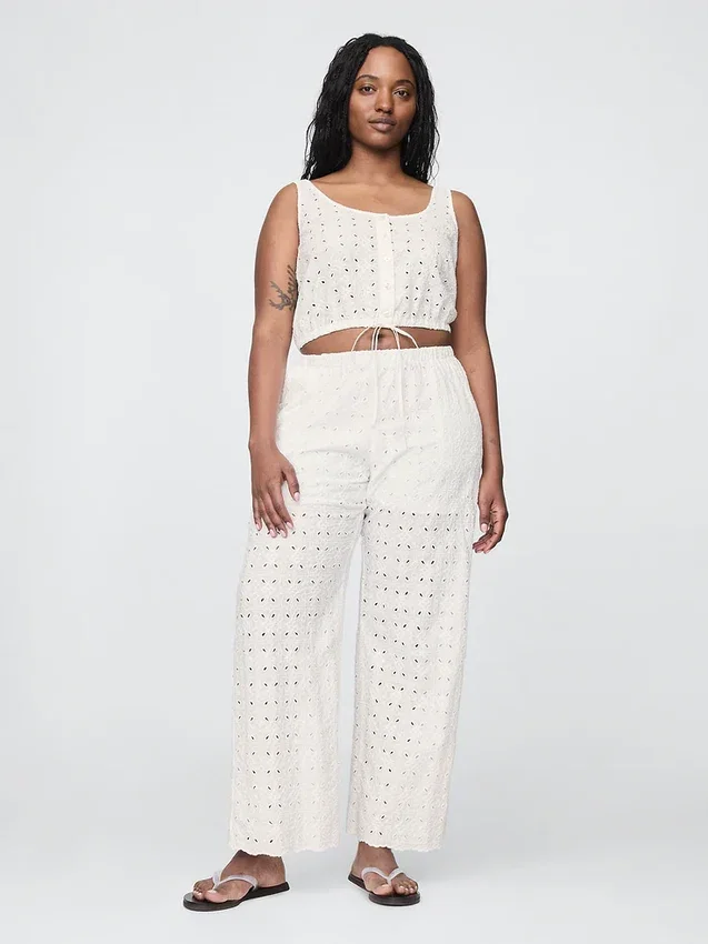 Pantalon ample à taille mi-haute et œillets